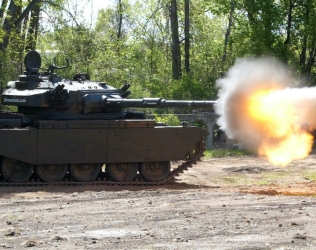Drive and Shoot a Real Tank